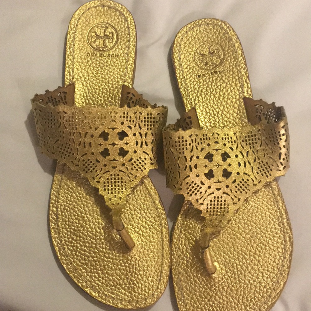 Sold. Fun gold Tory Burch